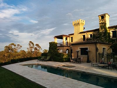 View of the house from the poolside lawn