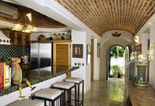 Kitchen looking towards entry door.