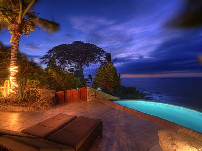 Your own beautiful pool hangs above the crashing surf